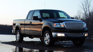 truck sitting by lake