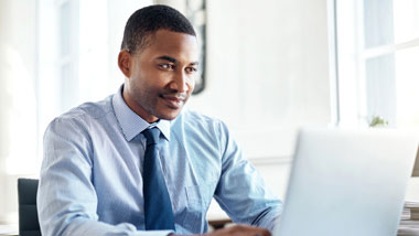man working on computer
