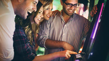 players celebrate slot machine win